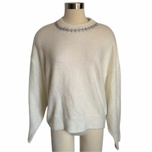 Elegant White Sweater with Embellished Neckline